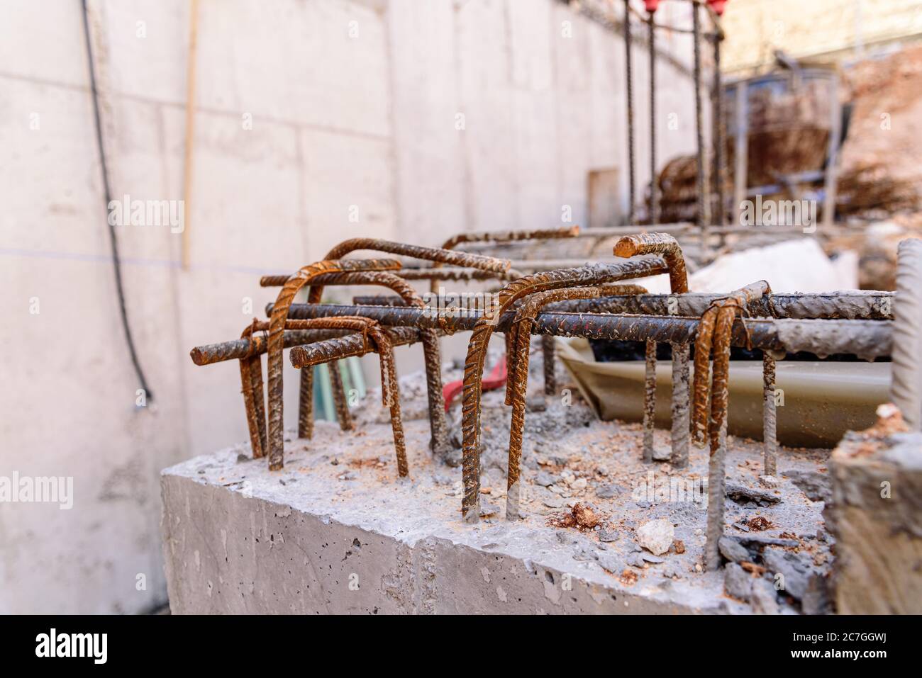 Detail of steel bars inside cement for the reinforced concrete of the