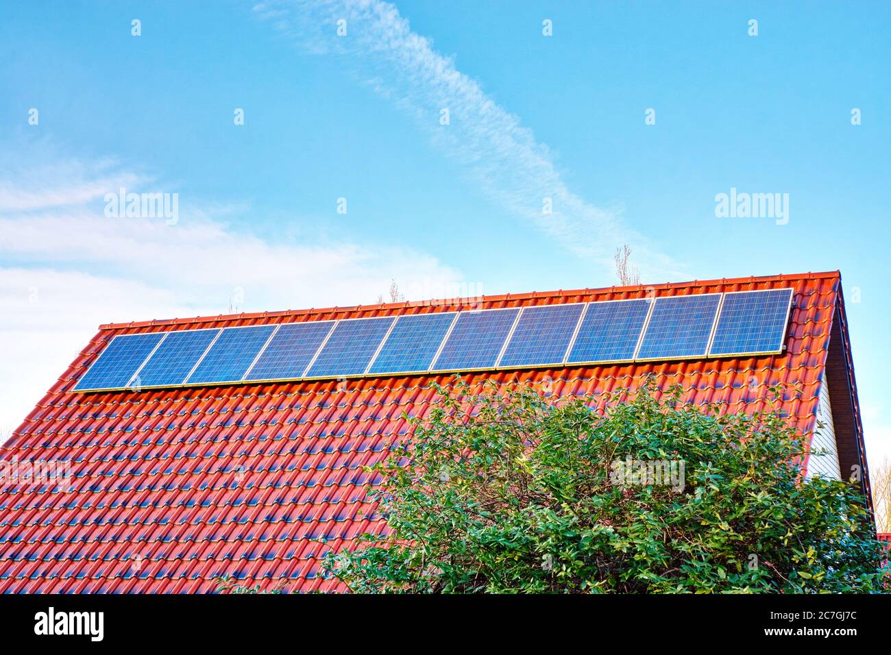 New solar panels on a red roof with a beautiful sky Stock Photo - Alamy