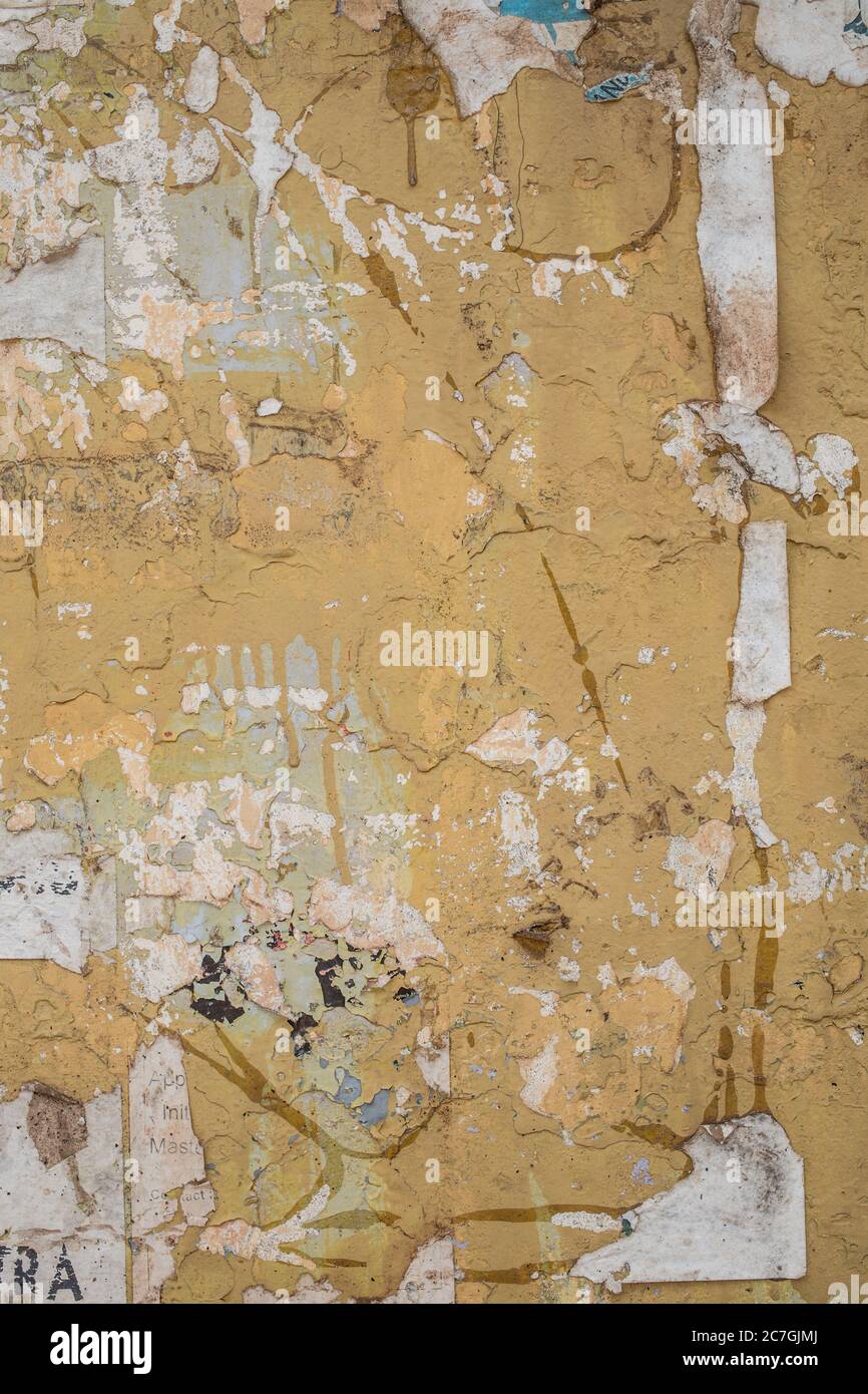 An old yellow weathered wall Stock Photo