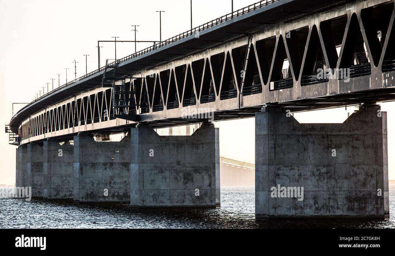 Bridge over the sea with a foggy background Stock Photo - Alamy