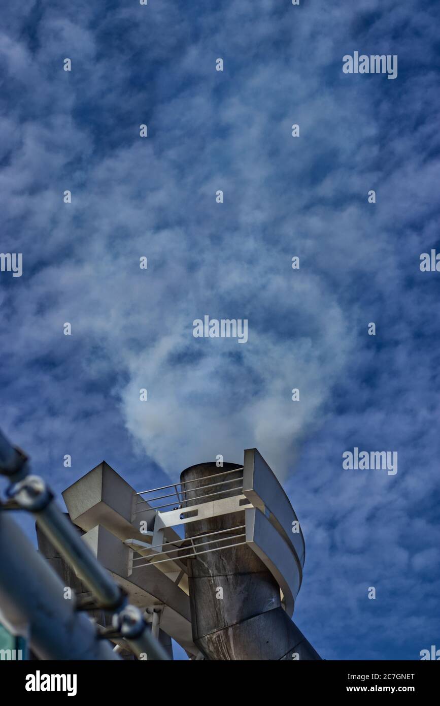 Co2 pollution coming out of a cruise ship Stock Photo