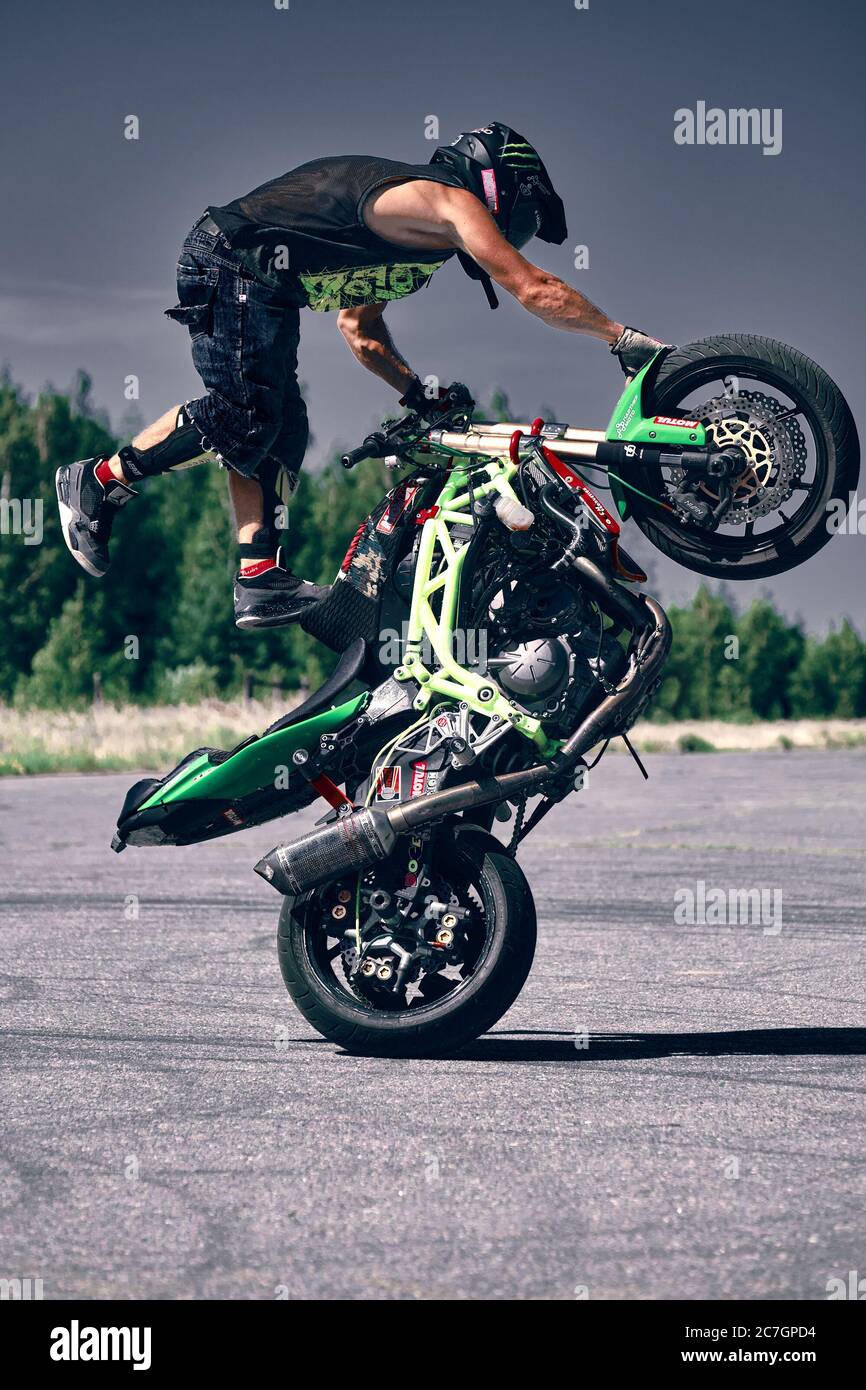 Moscow, Russia - 17 Jul 2020: Moto rider making a stunt on his motorbike.  Motorcyclist making wheelie a difficult and dangerous stunt on his  motorbike Stock Photo - Alamy