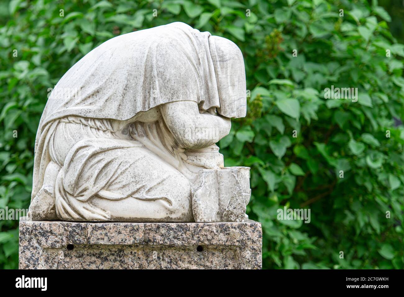 Vintage marble statue at an old graveyard or cemetery Stock Photo Alamy