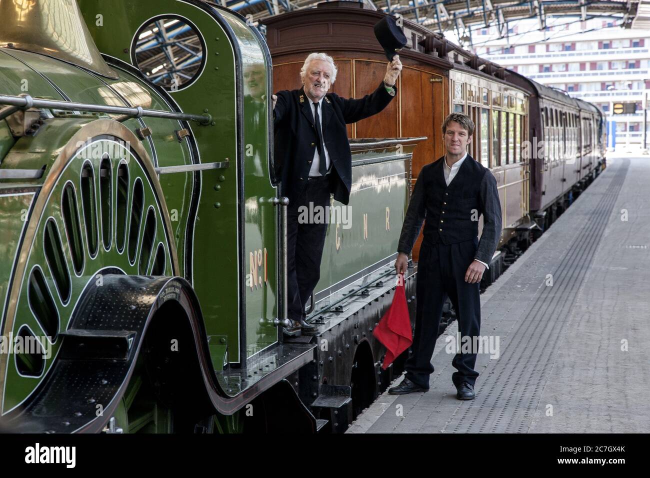 LONDON, UNITED KINGDOM - Jun 03, 2010: Bernard Cribbins and Marshall Lancaster on the set of The Railway Children, Waterloo Station Stock Photo