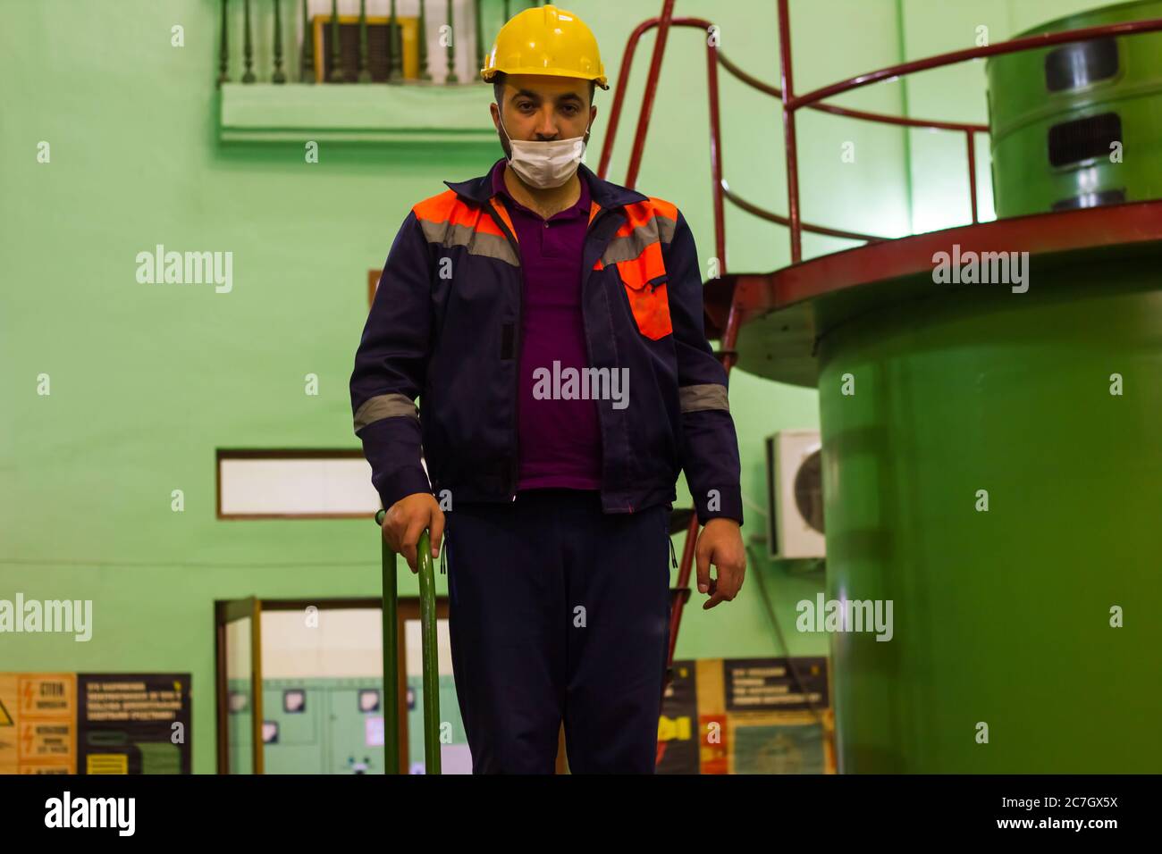 Download Construction Worker On Construction Site Worker In Protective Mask Worker In Medical Mask Construction Worker With Yellow Helmet Stock Photo Alamy PSD Mockup Templates