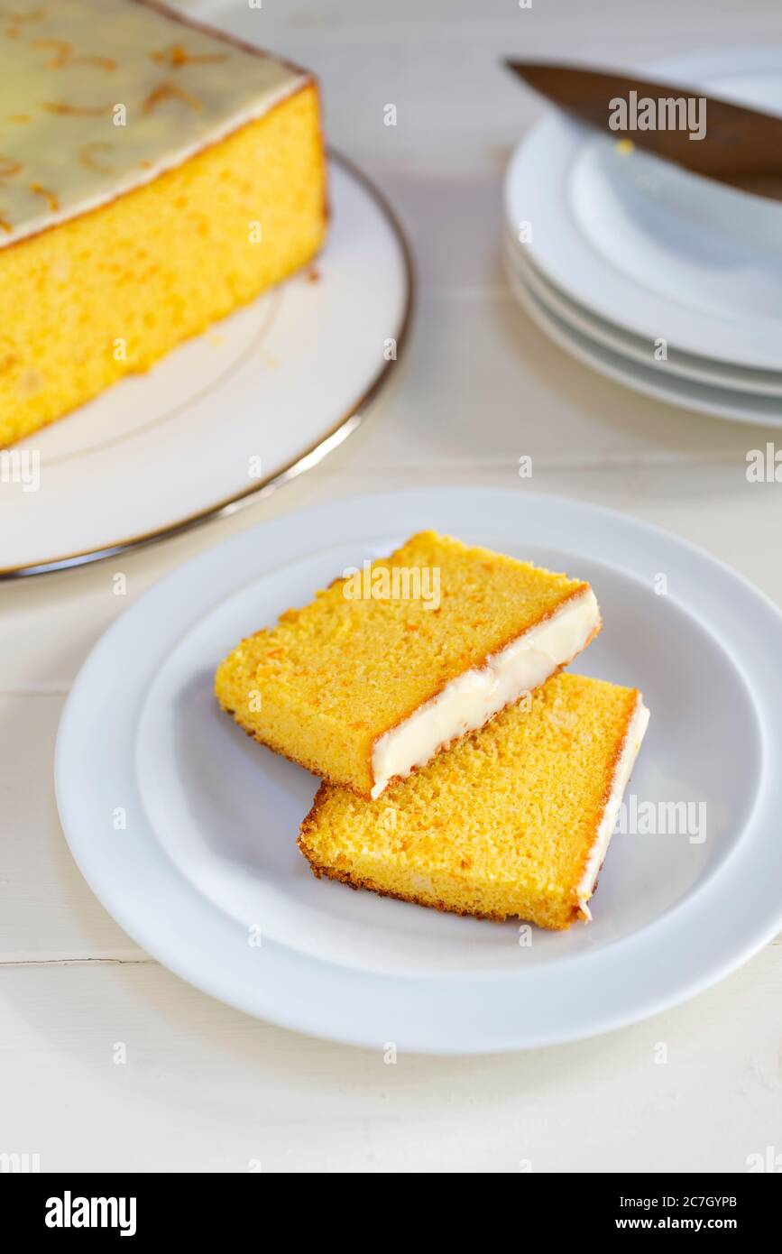 Slices of freshly baked gluten free orange and almond polenta cake. Stock Photo