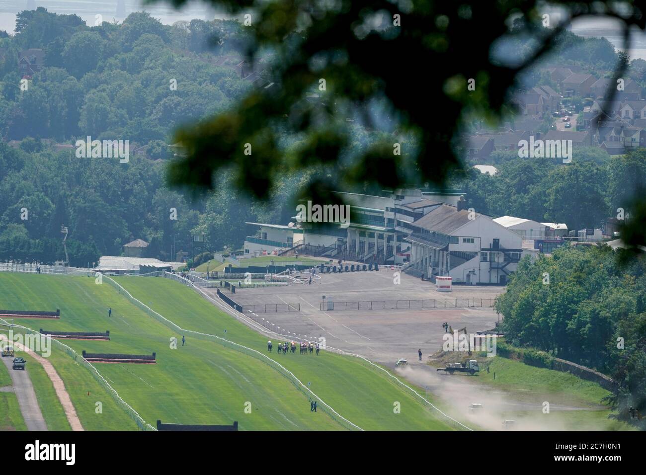 A general view as runners make their way down the track in The NB Builders Merchants Novice Median Auction Stakes at Chepstow Racecourse. Stock Photo