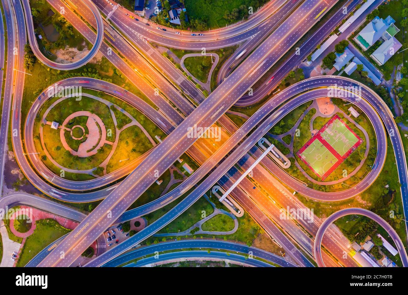 Aerial view footage of car traffic of expressway and intersection in urban. concept or infrastructure and transportation Stock Photo