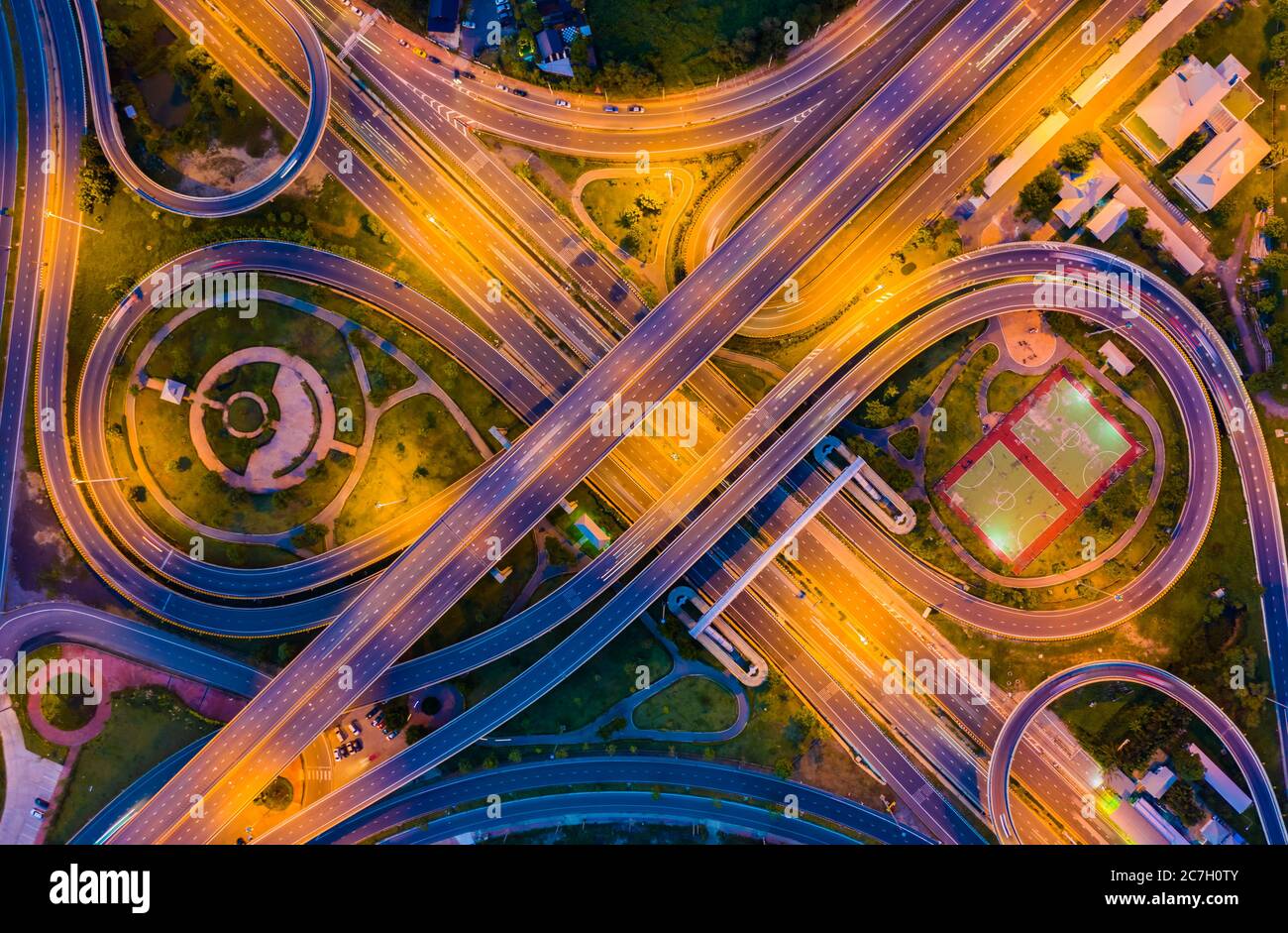 Aerial view footage of car traffic of expressway and intersection in urban. concept or infrastructure and transportation Stock Photo