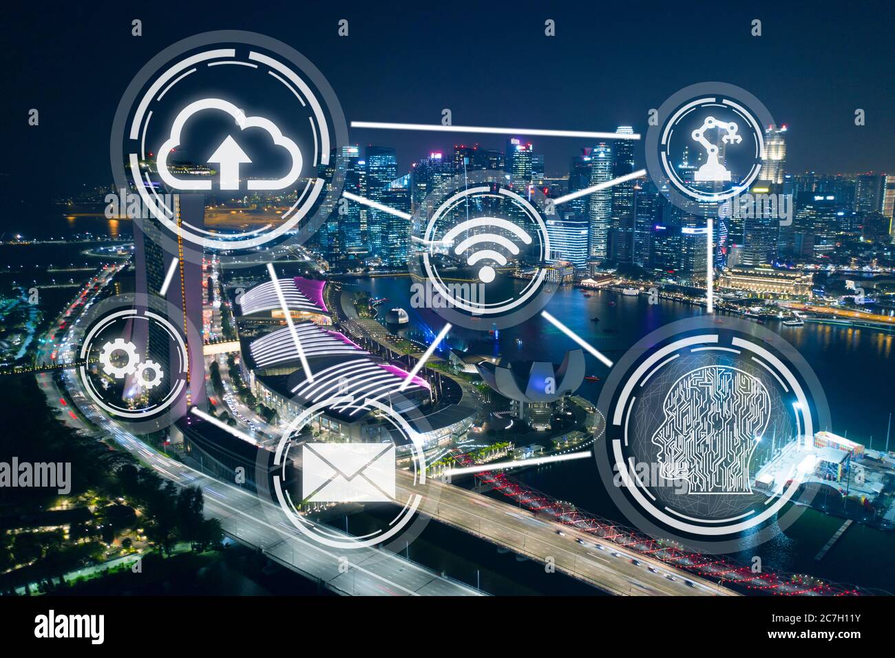 Smart city, wireless technology abstract on Singapore financial district background at night Stock Photo