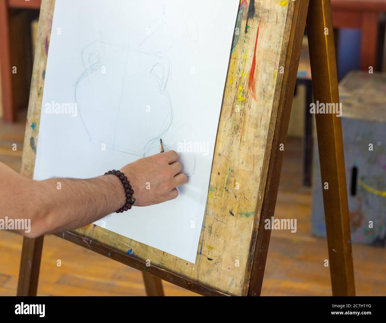 hand drawing a picture, man drawing a picture Stock Photo