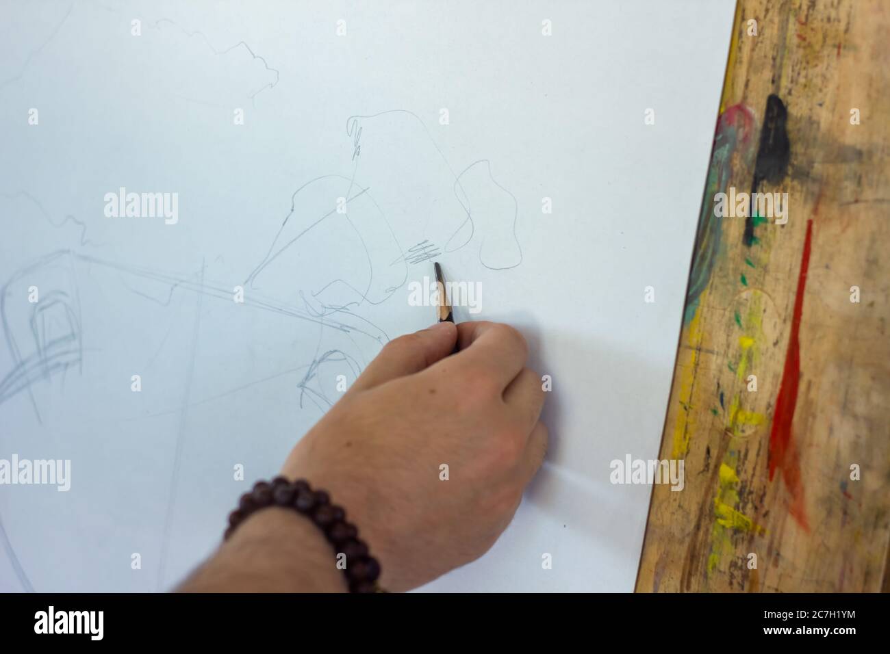 hand drawing a picture, man drawing a picture Stock Photo