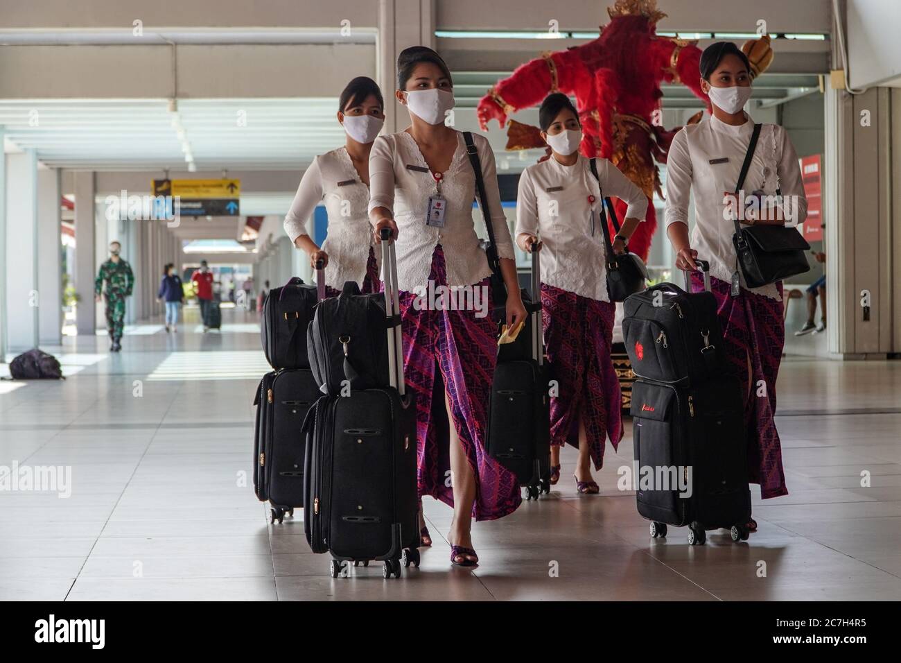 Badung Bali Indonesia 17th July 2020 A Group Of Flight Attendant Women Walks Along The Airport