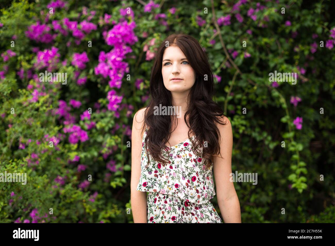 Portrait of young beautiful woman at the park outdoors Stock Photo - Alamy