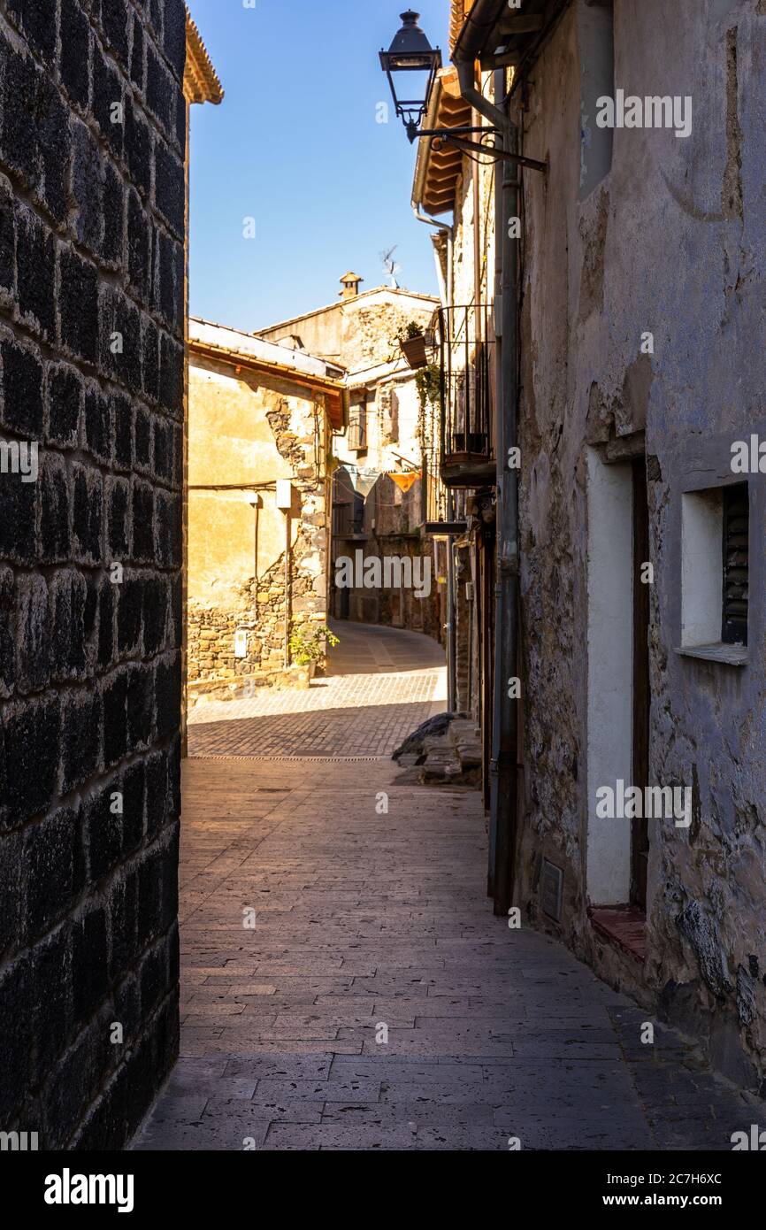 Europe, Spain, Catalonia, Gerona Province, La Garrotxa, narrow street in the old town of Castellfollit de la Roca Stock Photo