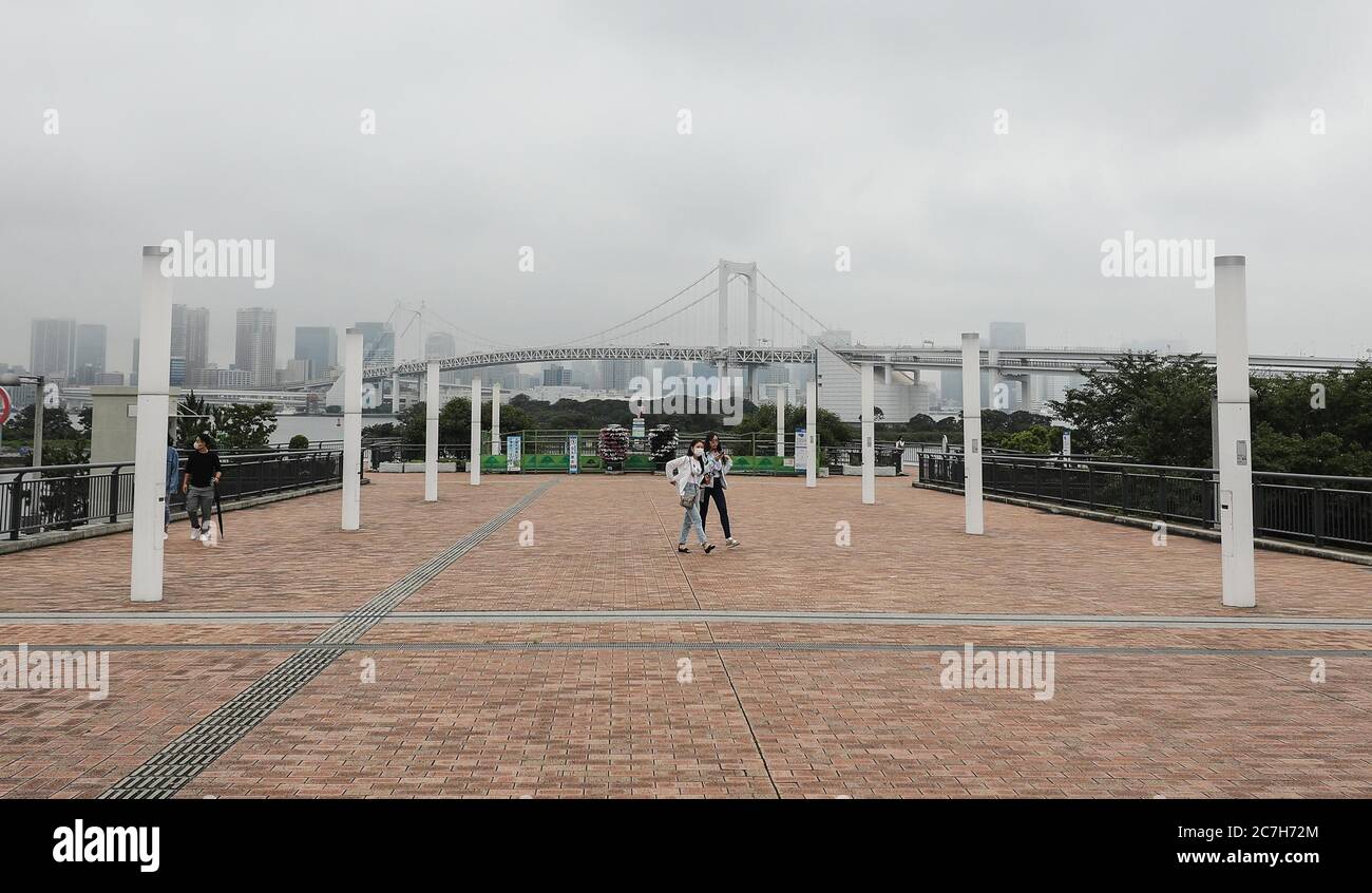 Tokyo, Japan. 17th July, 2020. Visitors are seen at the sightseeing spot Odaiba area in Tokyo, Japan, on July 17, 2020. The Tokyo metropolitan government reported a fresh record number of 293 daily coronavirus cases on Friday. Credit: Du Xiaoyi/Xinhua/Alamy Live News Stock Photo