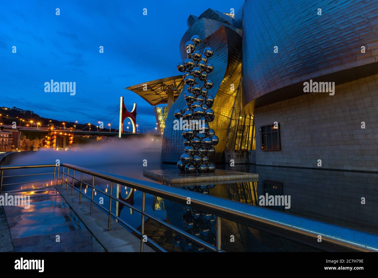 Europe, Spain, Basque Country, Vizcaya Province, Bilbao, Guggenheim Museum Bilbao in the evening Stock Photo