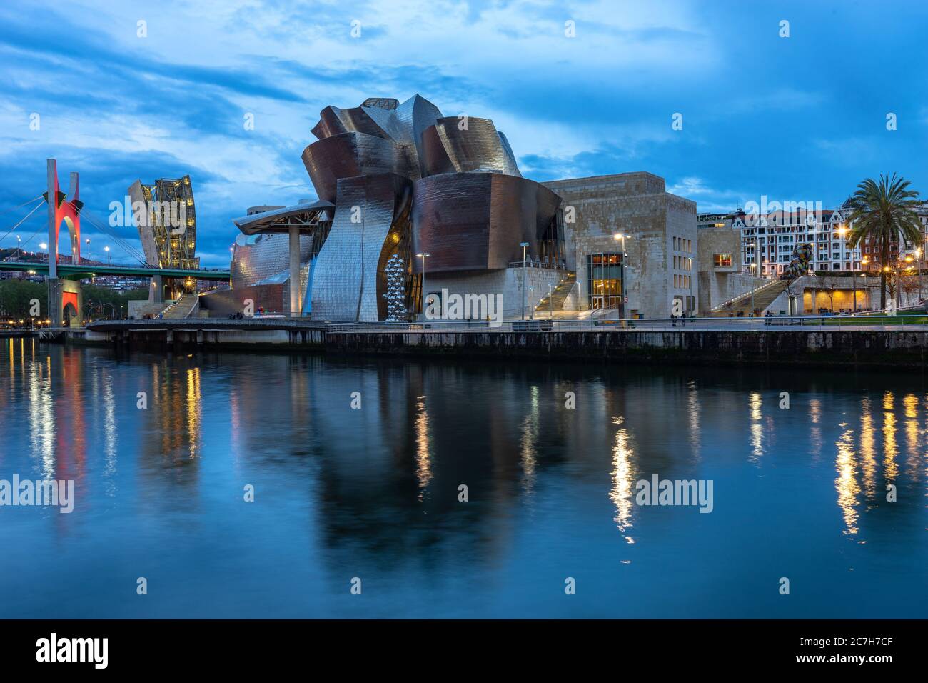 Europe, Spain, Basque Country, Vizcaya Province, Bilbao, Guggenheim Museum Bilbao in the evening Stock Photo
