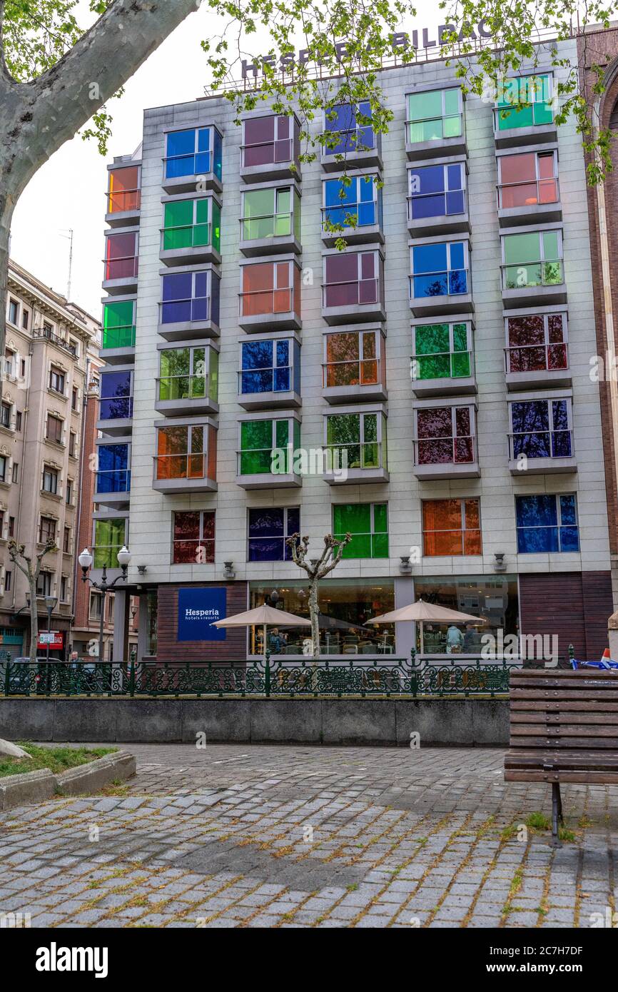 Europe, Spain, Basque Country, Vizcaya Province, Bilbao, facade with colorful windows at Hotel Hesperia Bilbao Stock Photo