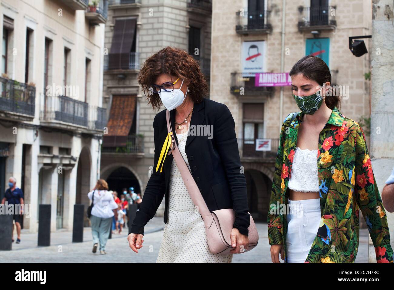Two women wearing face masks, Gerona, Spain Stock Photo Alamy
