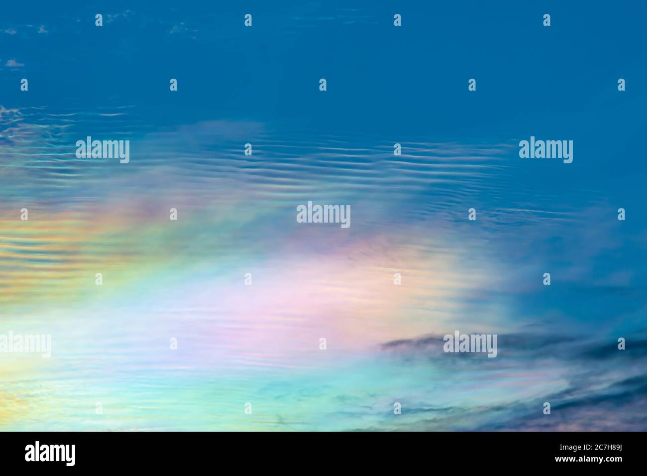 The beauty of the rainbow clouds on sky in the evening. Stock Photo