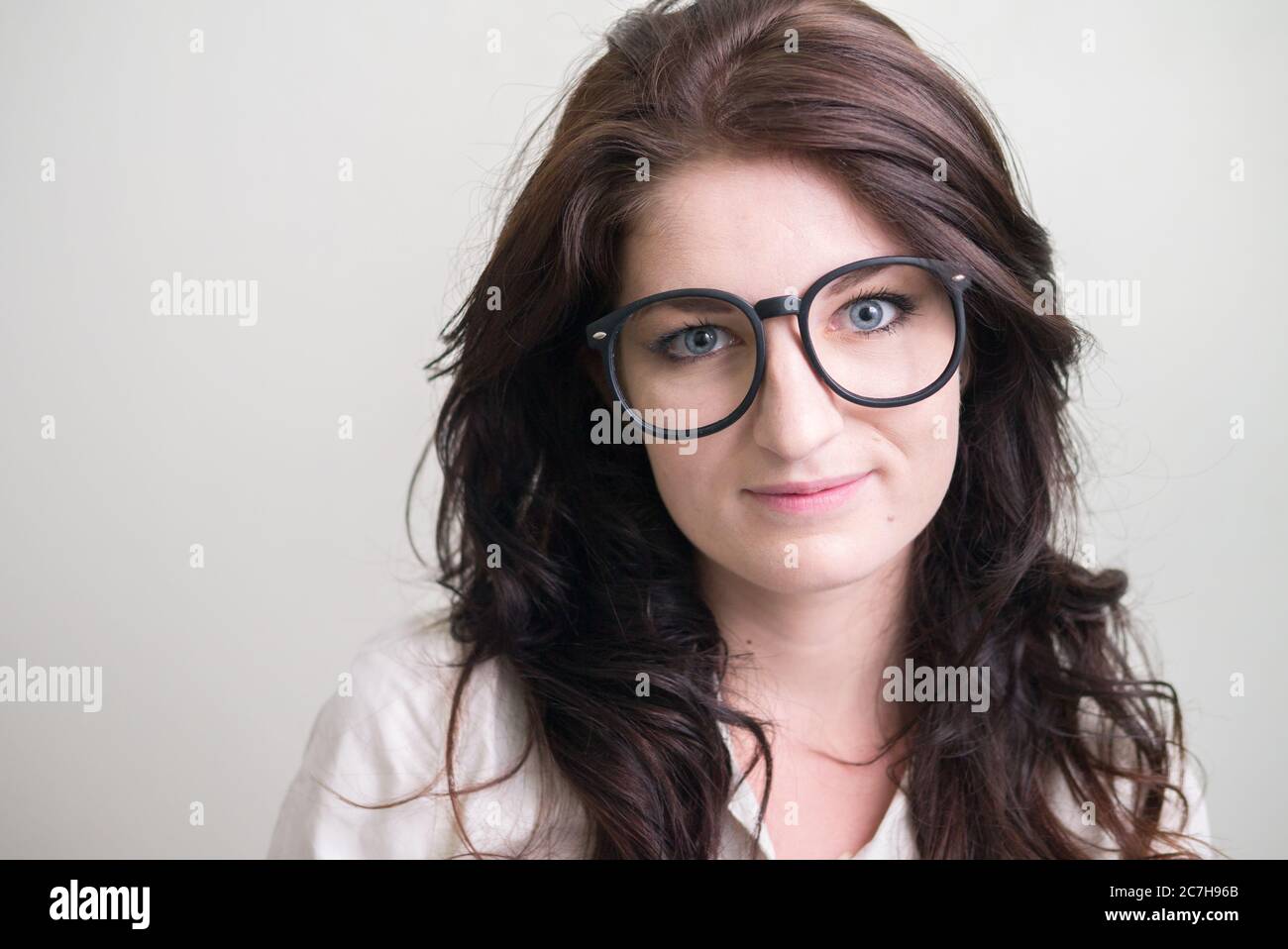 Portrait of young beautiful woman with brown hair Stock Photo - Alamy