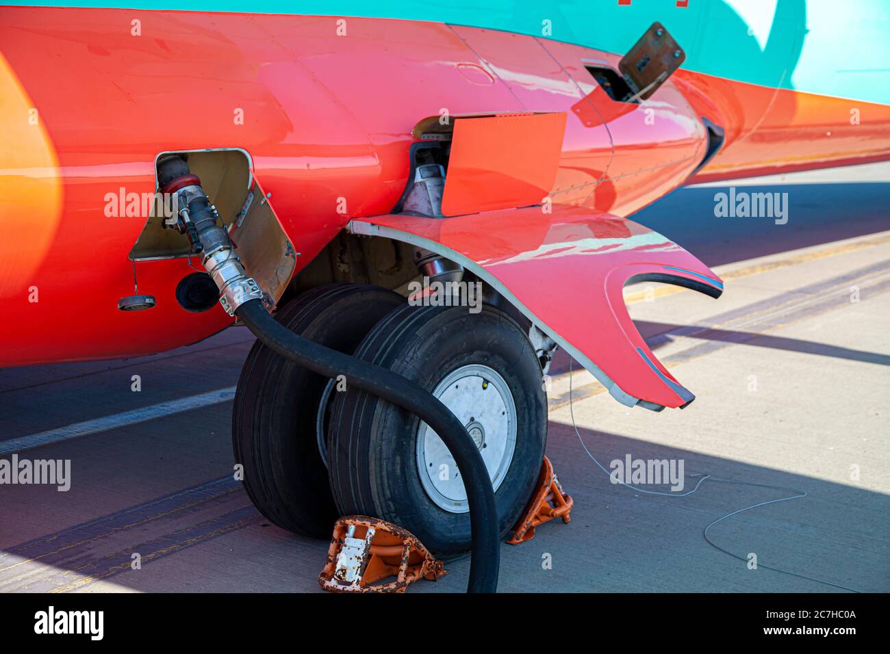 Refueling the plane at the airport. Gas tank hatch. Fuel tank. Copy space  Stock Photo - Alamy