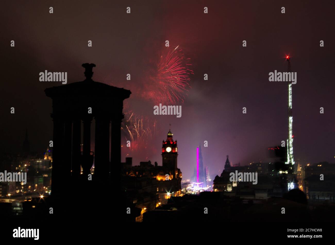 Low angle shot of the nighttime colorful fireworks in London Stock Photo