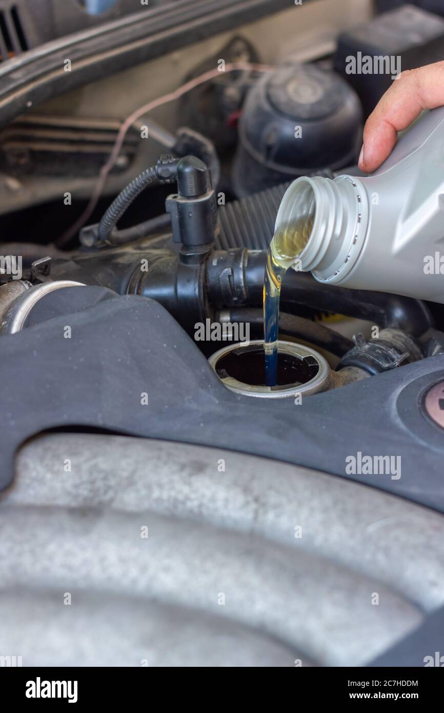Oil pouring into engine hires stock photography and images Alamy
