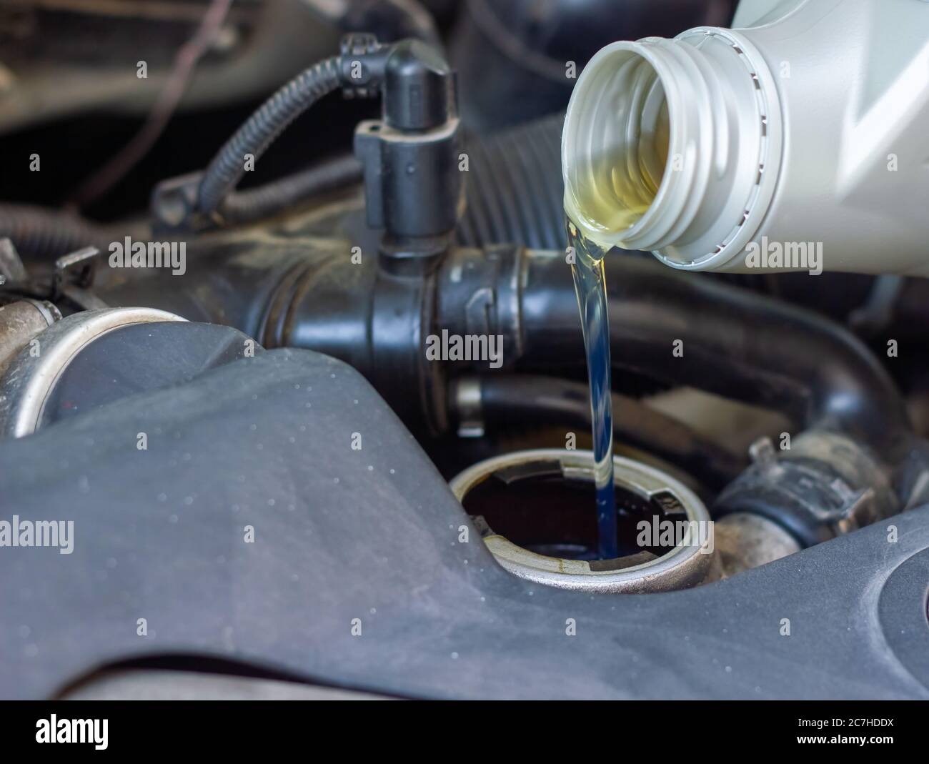 Oil pouring into engine hires stock photography and images Alamy