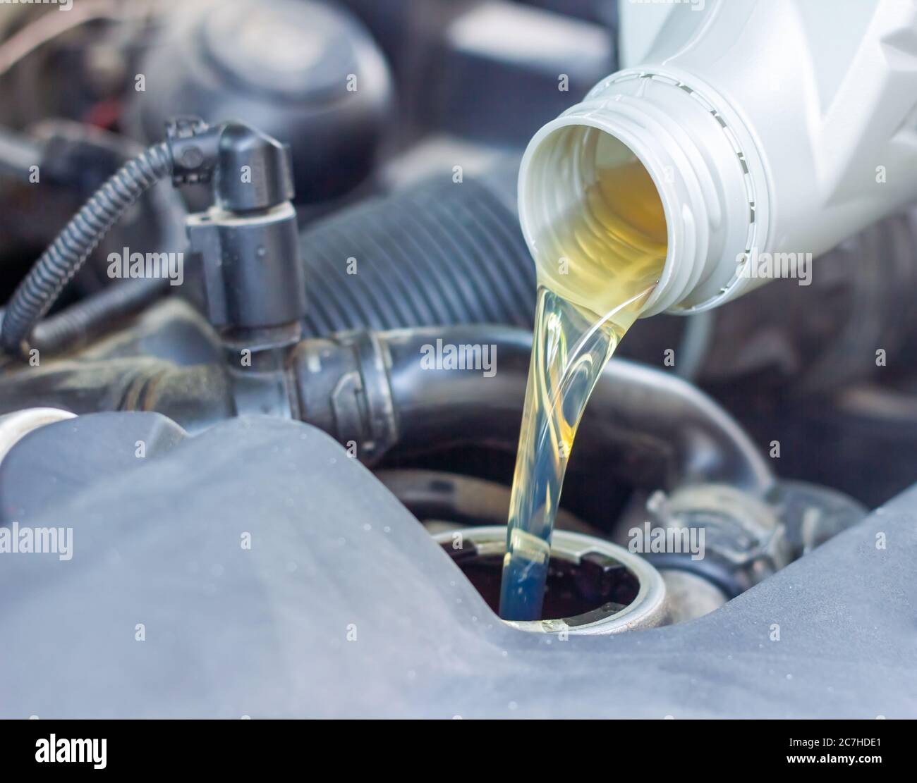 Oil pouring into engine hires stock photography and images Alamy