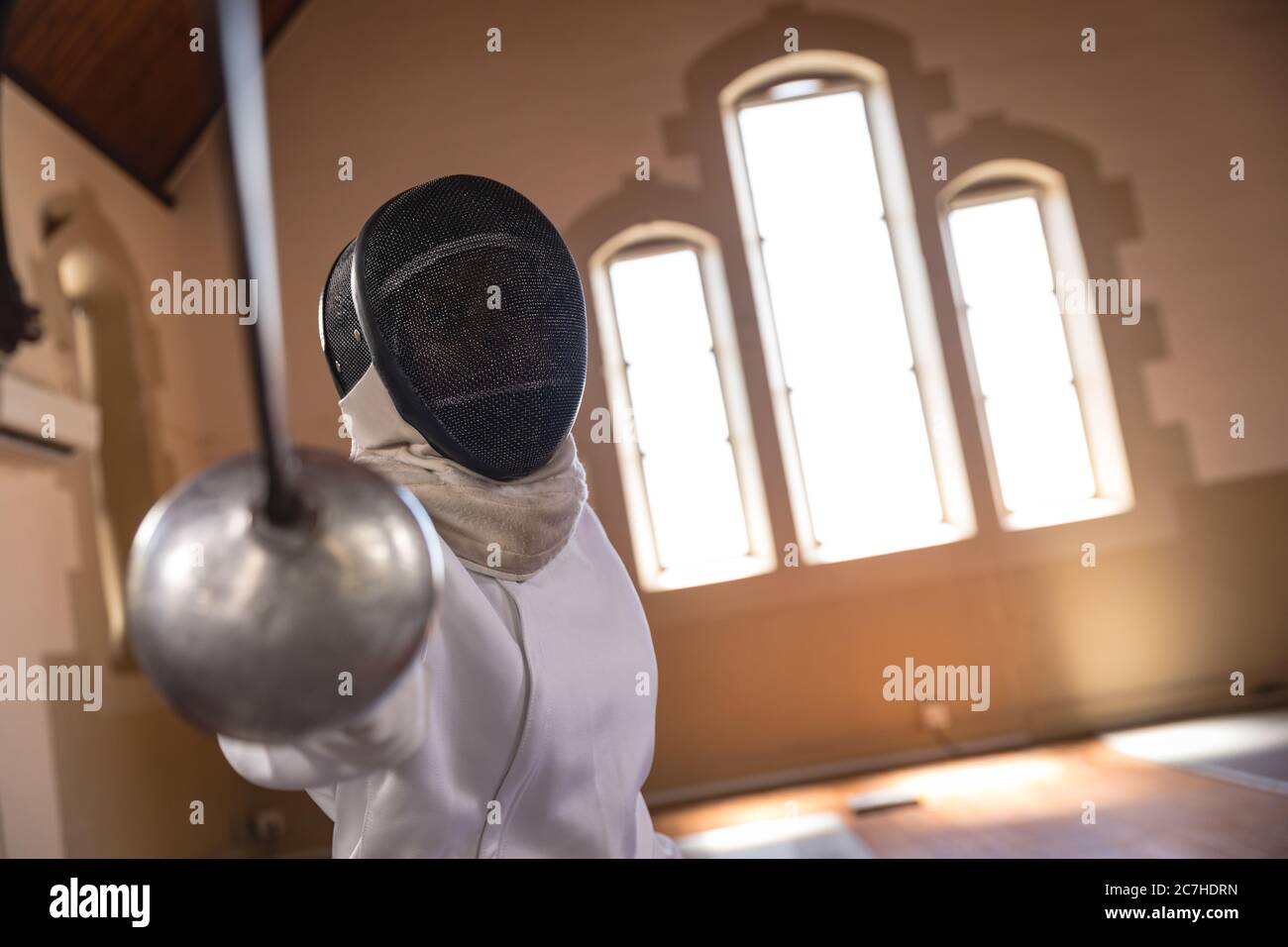 Female fencer practicing fencing Stock Photo