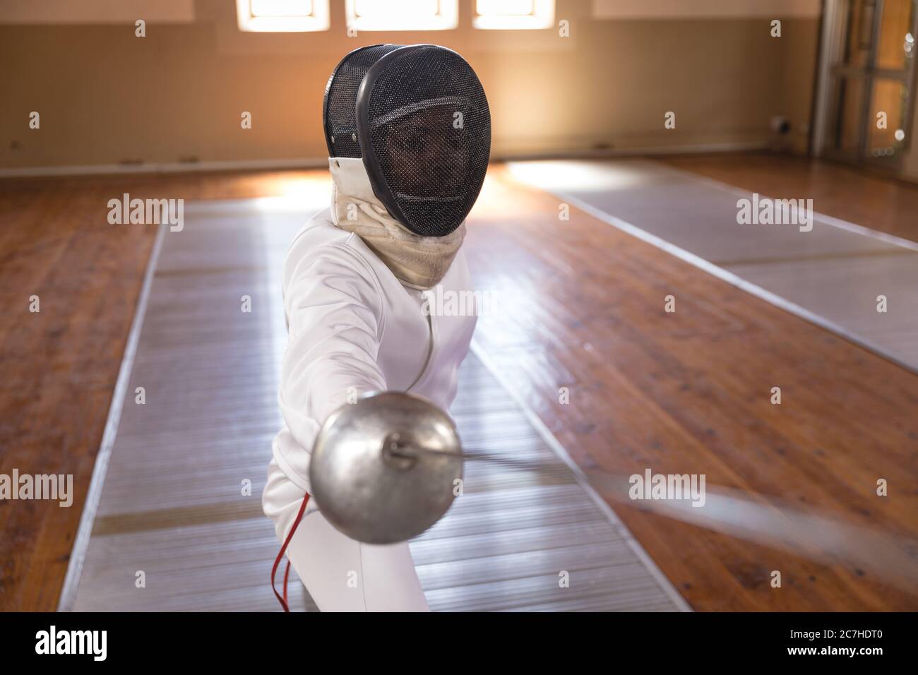 Female fencer practicing fencing Stock Photo