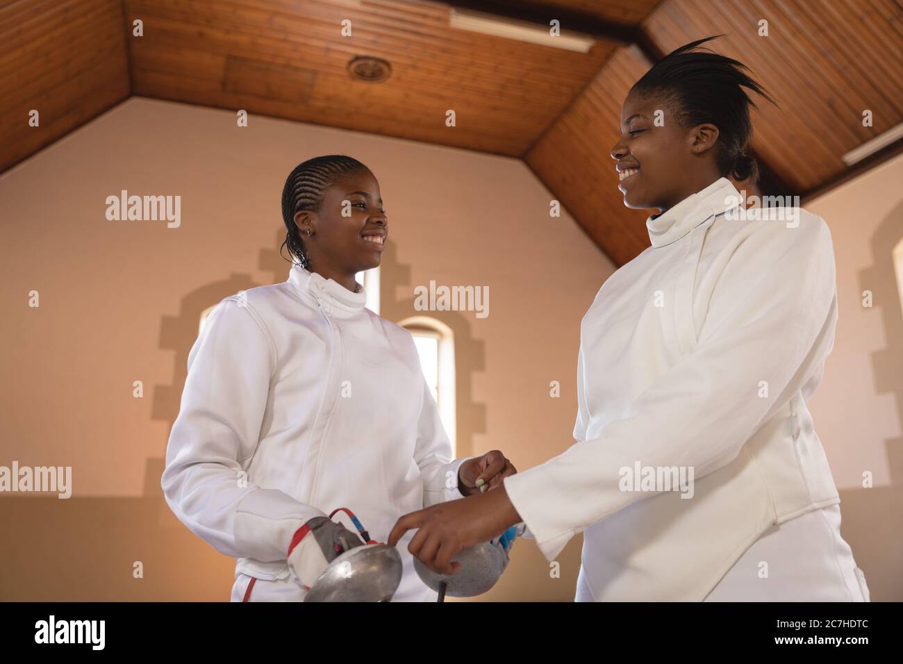 Two female fencers looking at each other Stock Photo