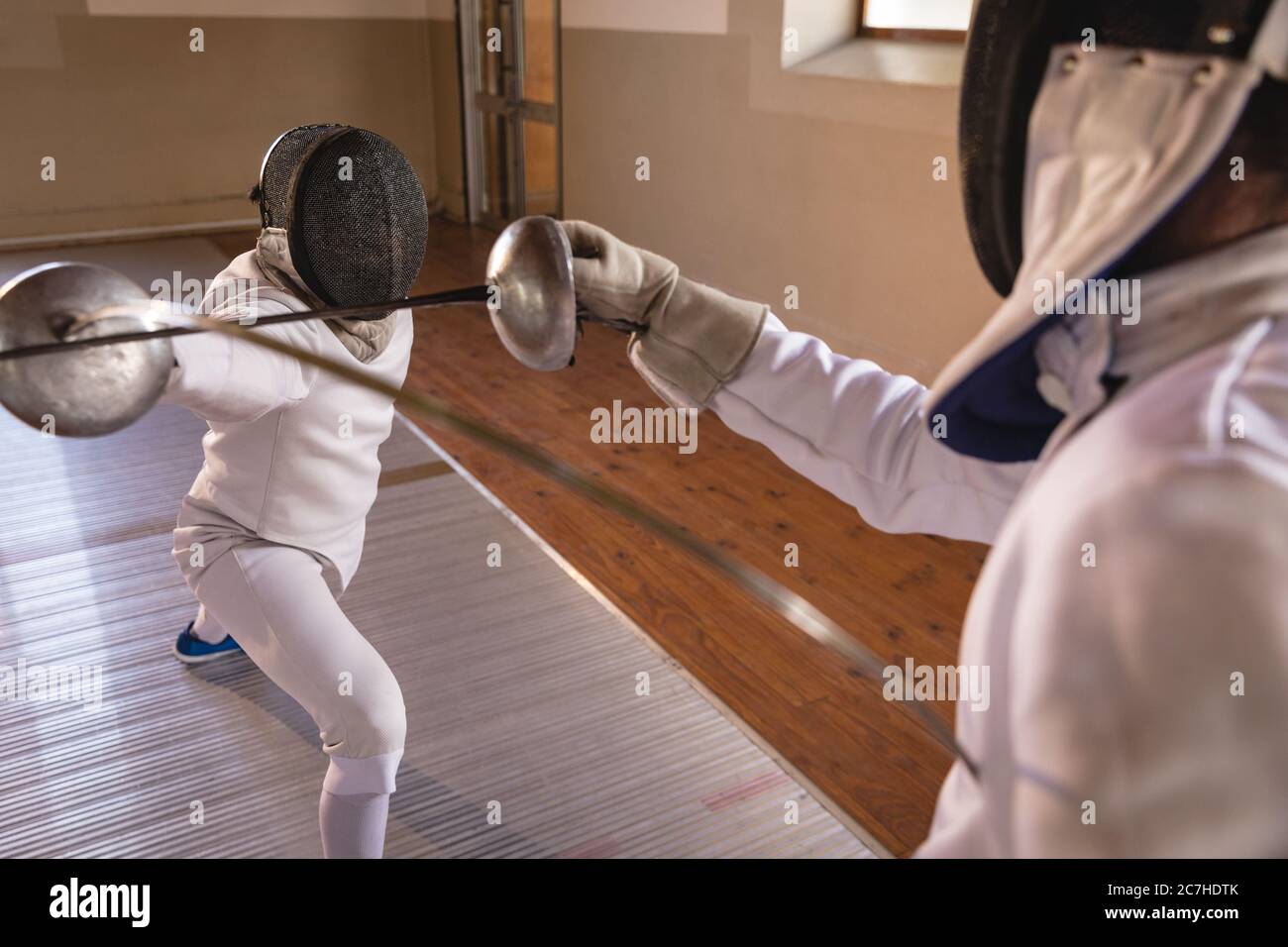 Two male fencers practicing fencing Stock Photo