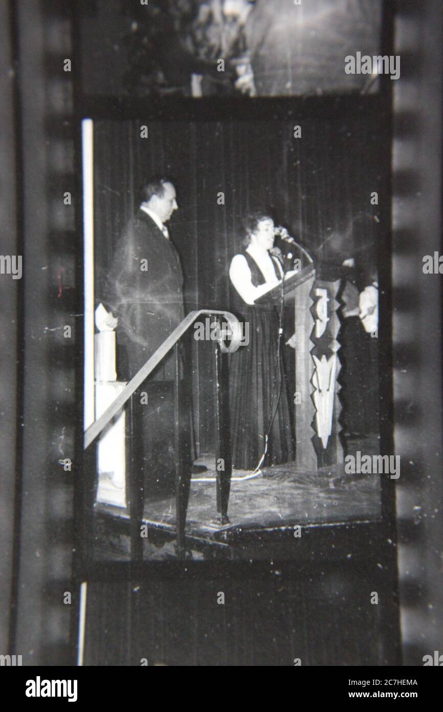 Fine 70s vintage contact print black and white photography of an honors assembly and a live stage performance. Stock Photo