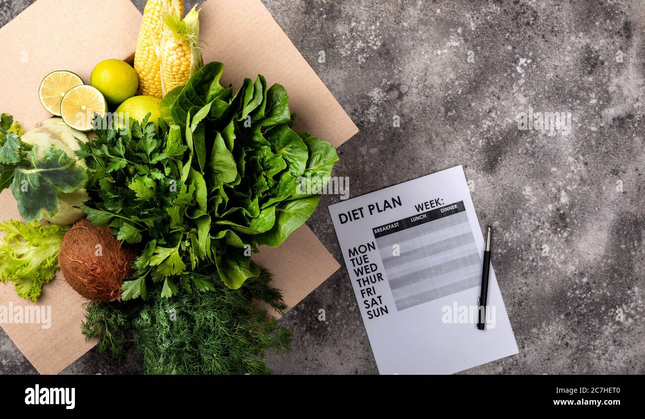 Box fresh vegetables and Diet Plan top view. Stock Photo