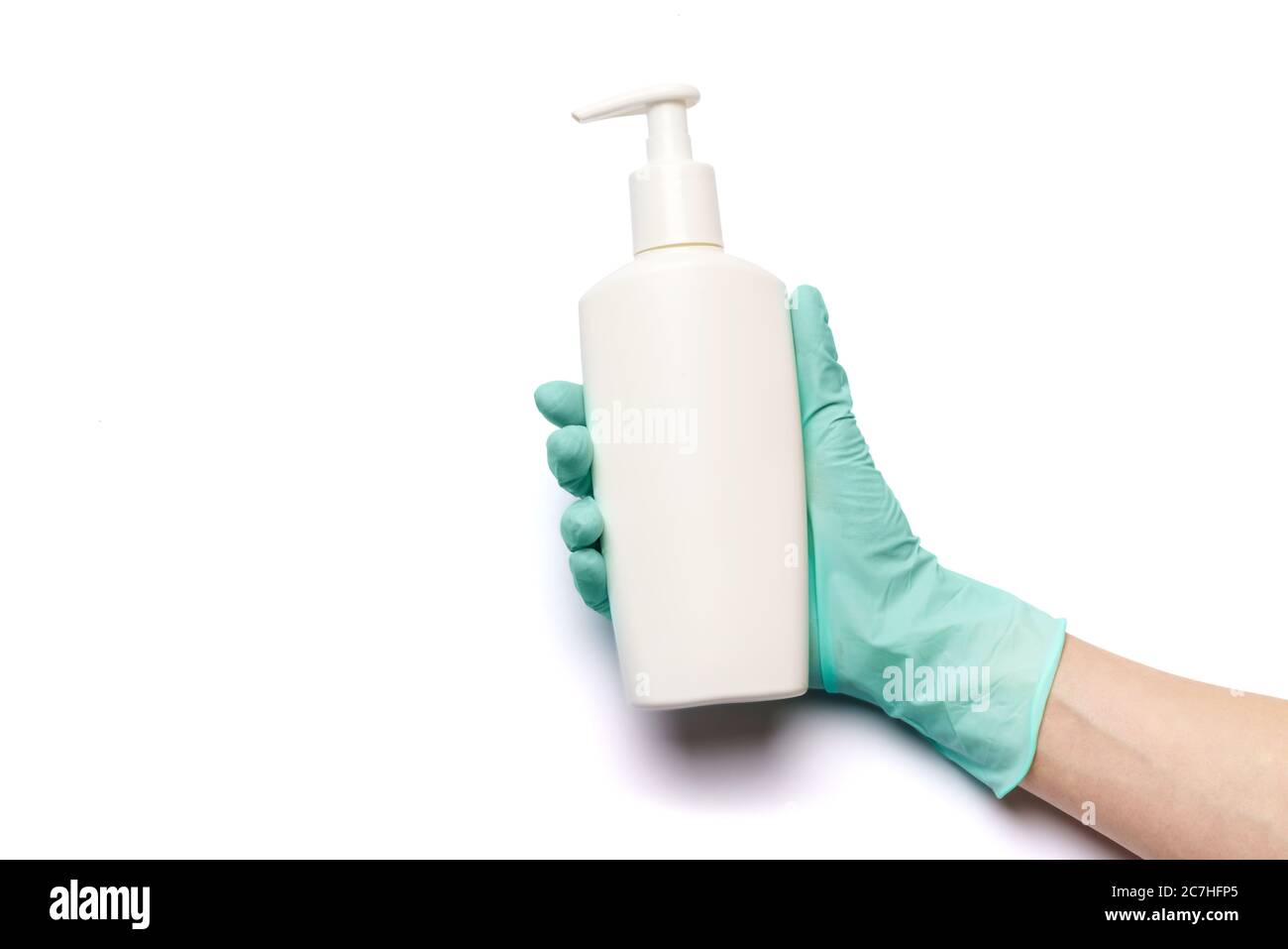 Female hand in latex rubber glove and hand sanitizer spray dispenser