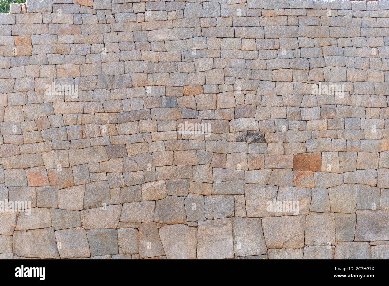 Stones in a well-preserved Indian temple wall Stock Photo