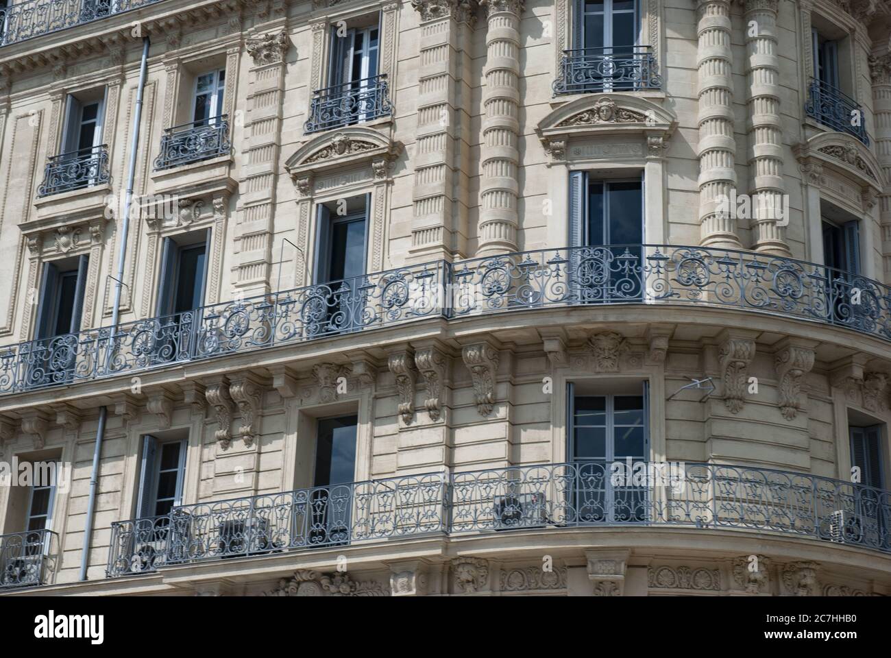 Apartment building with blue balconies in Marseille in France Stock