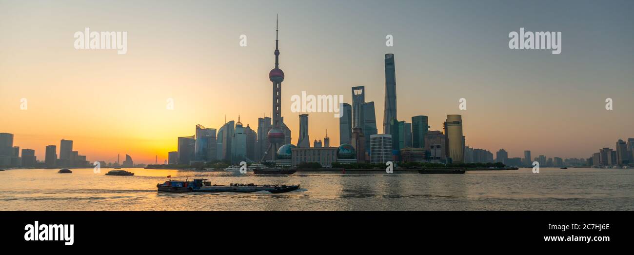 Shanghai Pudong at sunrise. Amazing panorama of the skyline with skyscrapers and Huangpu River. Stock Photo