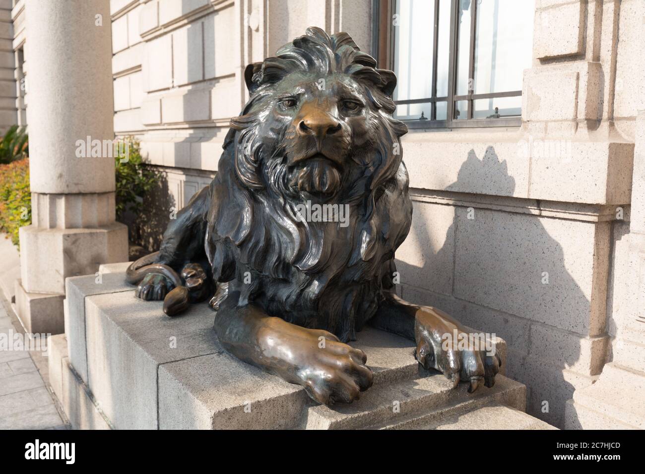 Lion sculpture guarding the entrance of the HSBC building at The Bund. Stock Photo