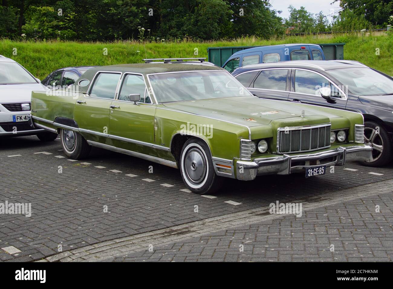 Pieterburen, the Netherland - July 16, 2020: Green Lincoln Continental Mark III parked on a public parking lot. Nobody in the vehicle. Stock Photo