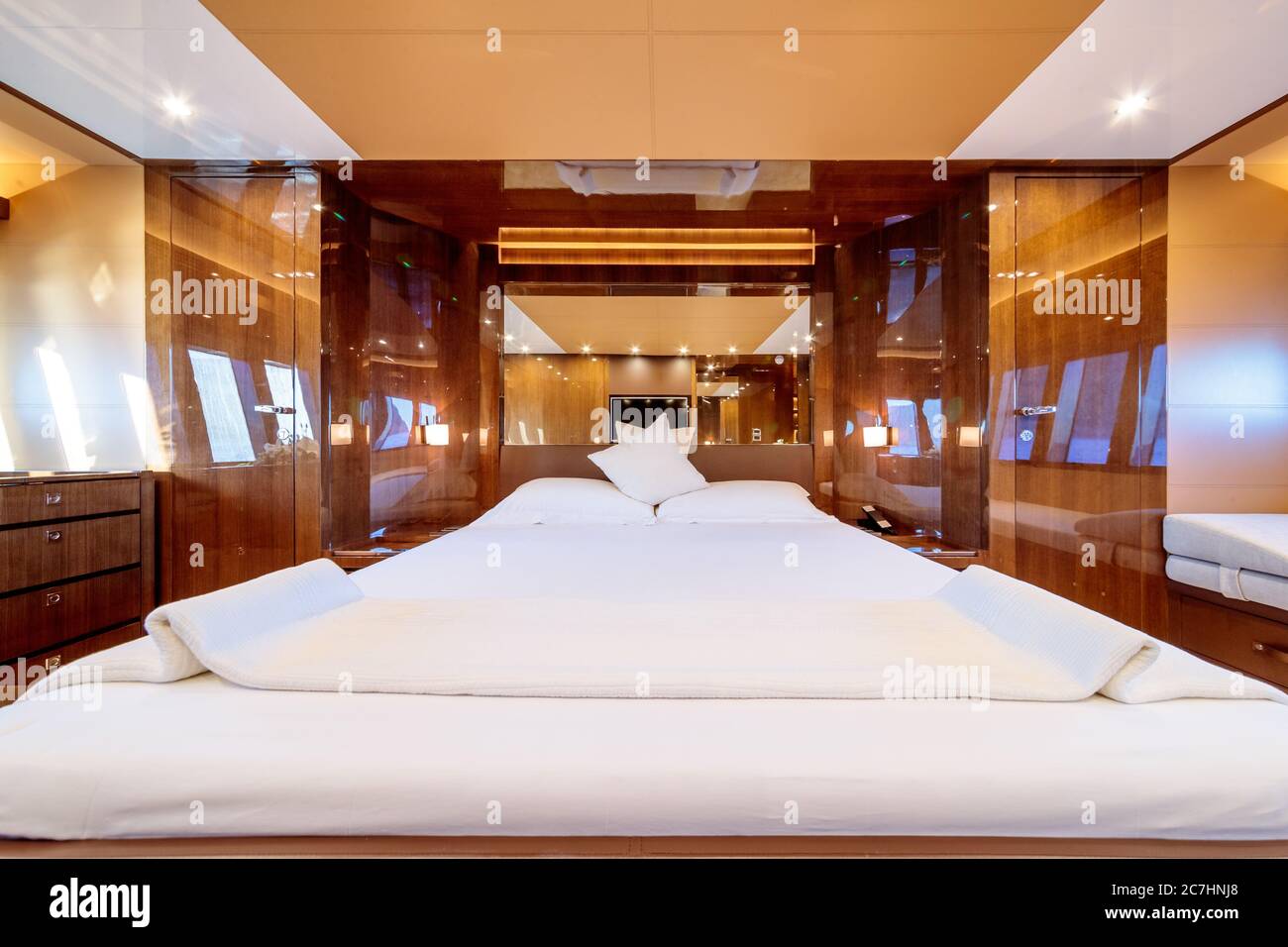 Interior shot of a big bedroom in the yacht Stock Photo - Alamy