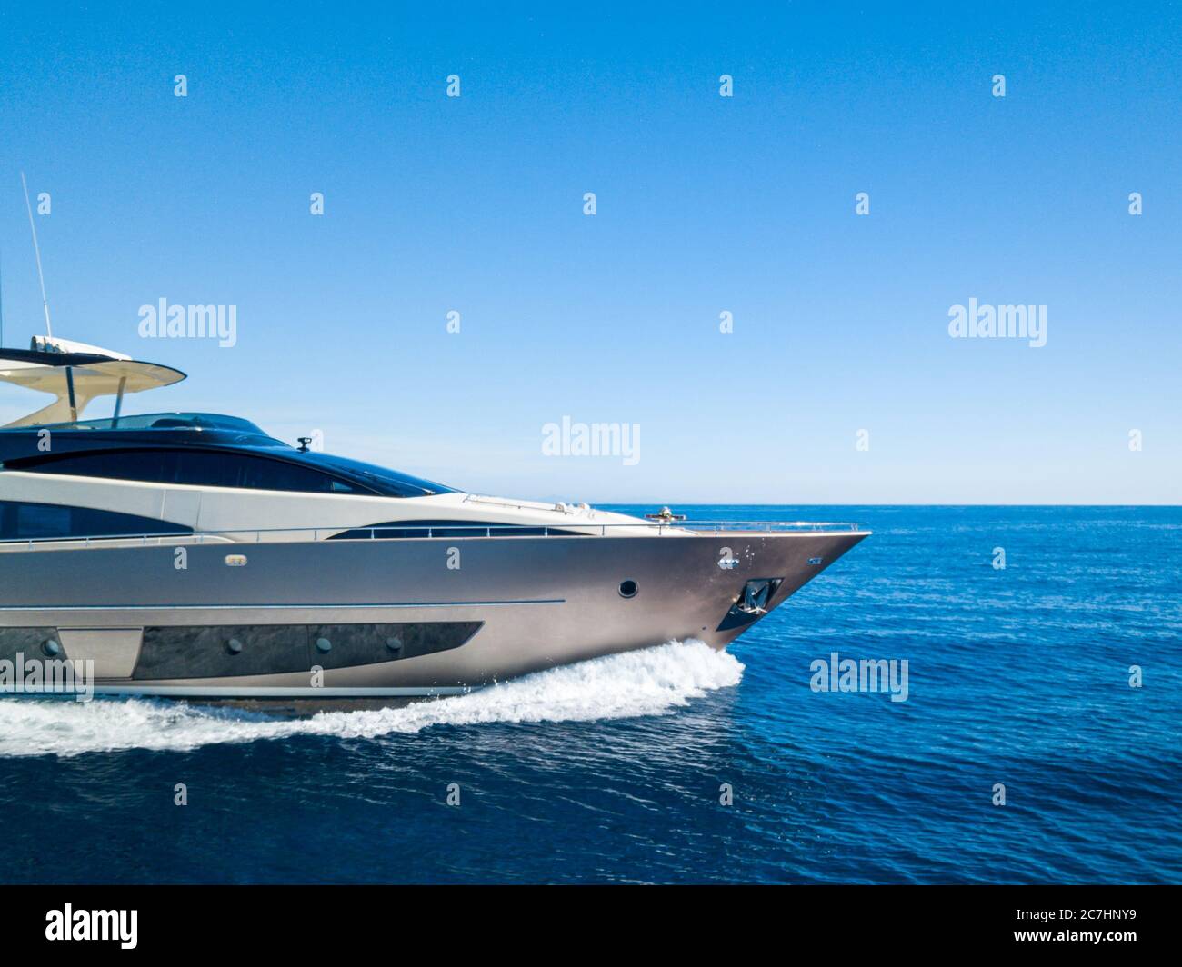 Yacht sailing on the sea with a clear blue sky in the background Stock ...