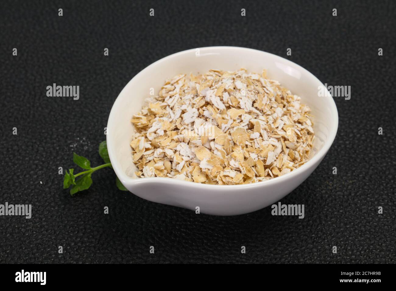 Raw oats in the bowl for breakfast Stock Photo Alamy