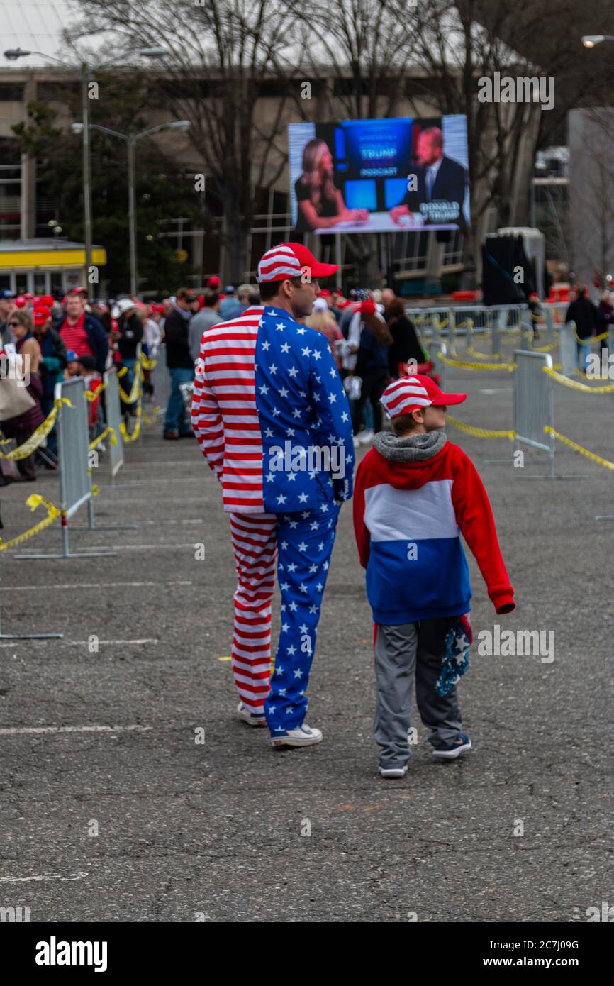 Patriotic supporter of President Trump forming in line to enter the campaign rally and hear the President's speech Stock Photo