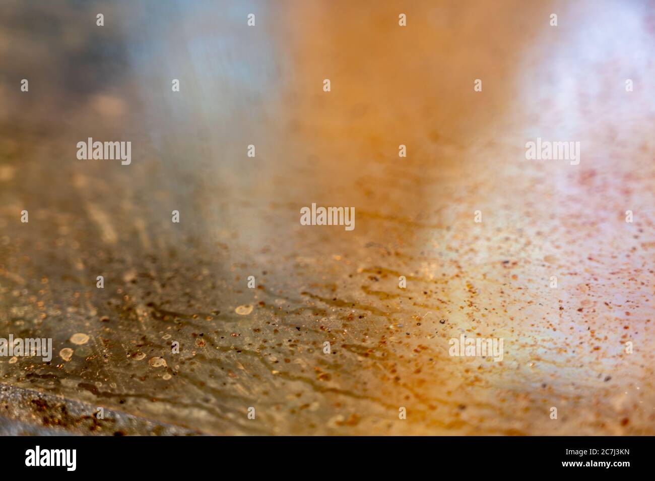 Inside picture of an oven to show burnt food and grease in need of