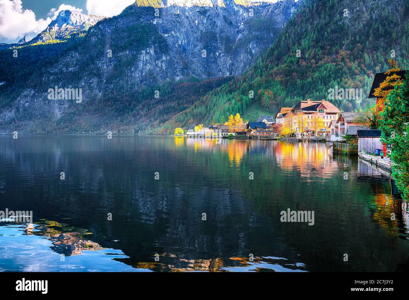 Scenic view of famous Hallstatt mountain village with Hallstatter lake ...