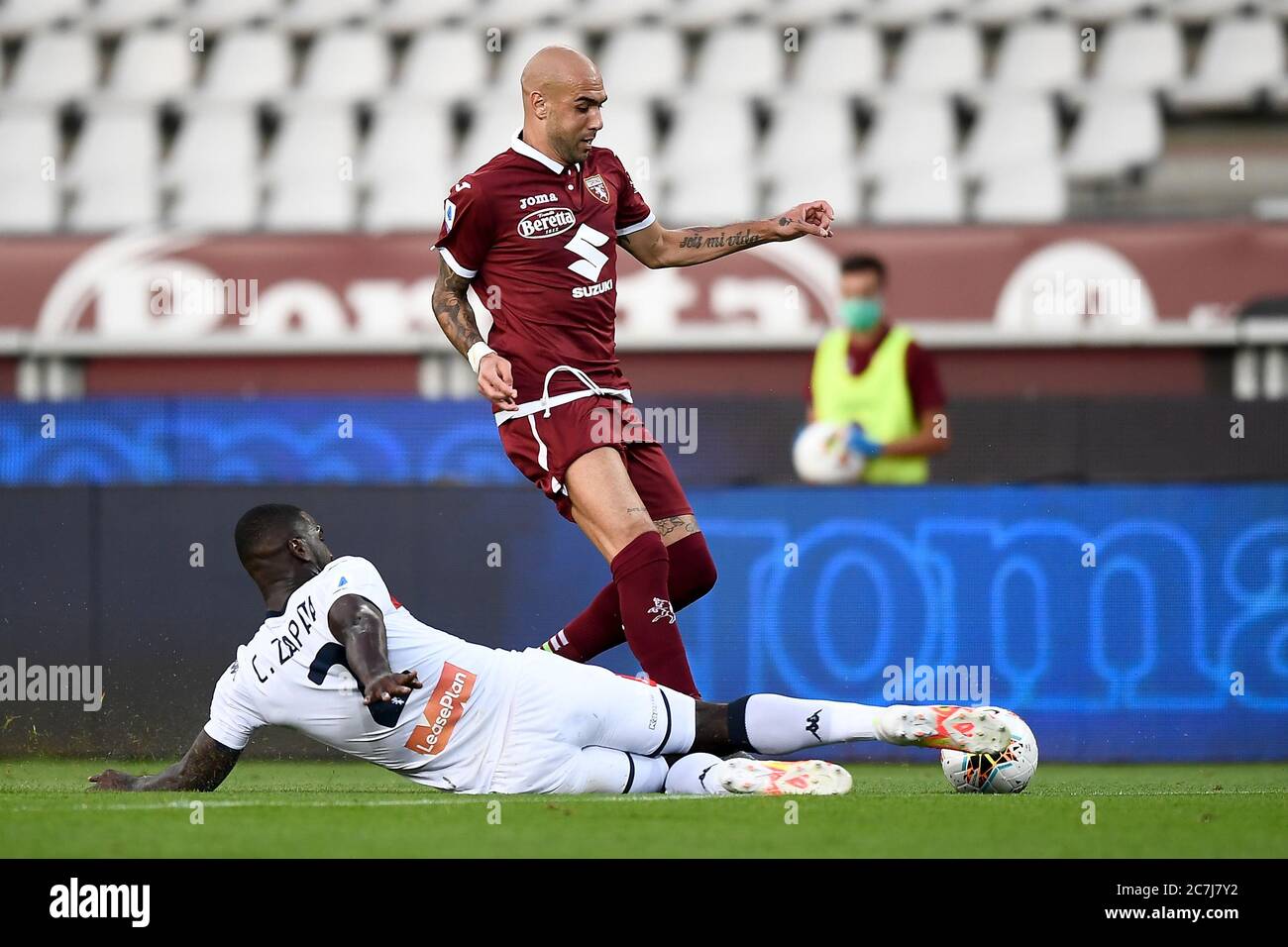 Turin, Italy - 16 July, 2020: Simone Zaza of Torino FC is tackled by Cristian Zapata of Genoa CFC during the Serie A football match between Torino FC and Genoa CFC. Torino FC won 3-0 over Genoa CFC. Credit: Nicolò Campo/Alamy Live News Stock Photo
